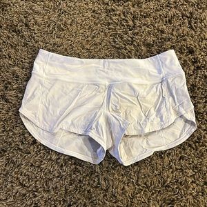LULULEMON speed up shorts in white size 6.